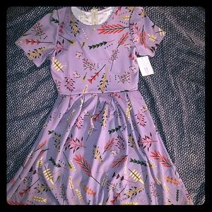 NWT LULAROE M AMELIA purple with flowers.